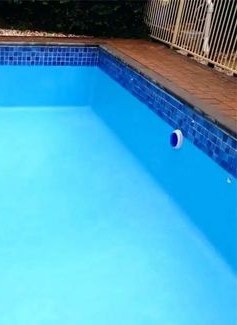 Pool after cleaning, clean blue tile